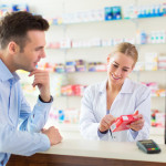 Pharmacist and client at pharmacy